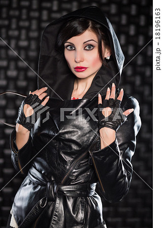 Portrait of brunette posing in black jacket Portrait of brunette posing in black jacket 18196163