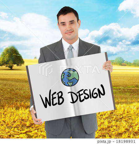 Composite image of businessman showing a book Composite image of businessman showing a book 18198931