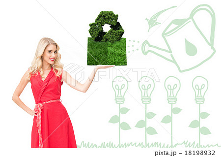 Composite image of woman holding lawn book Composite image of woman holding lawn book 18198932