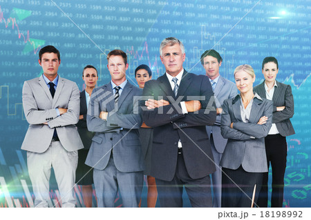 Composite image of business team standing arms crossed 18198992