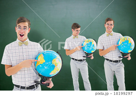 Composite image of nerd with globe Composite image of nerd with globe 18199297