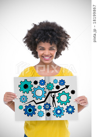 Composite image of pretty girl showing a book Composite image of pretty girl showing a book 18199867
