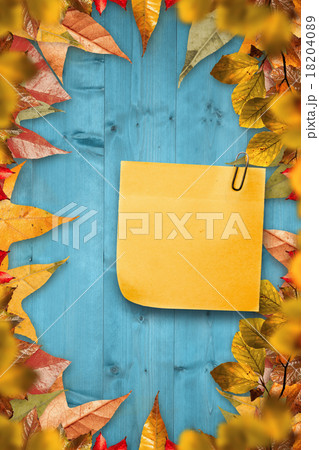 Composite image of sticky note with grey paperclip Composite image of sticky note with grey paperclip 18204089