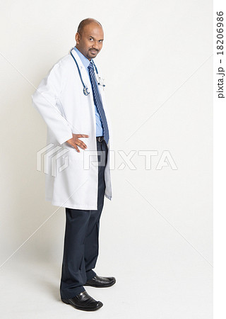 Mature Indian doctor full length side view Mature Indian doctor full length side view 18206986