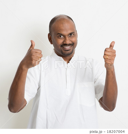 Mature casual business Indian man thumbs up Mature casual business Indian man thumbs up 18207004