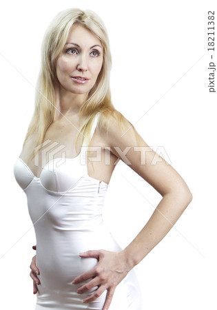 The young woman in a white combination 18211382
