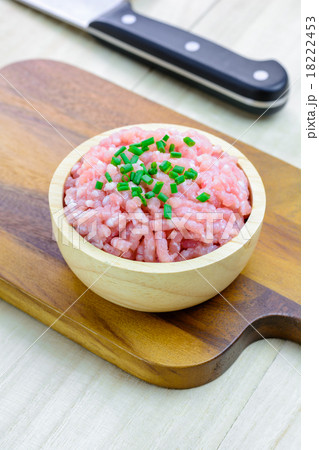 Minced pork in a bowl on the chopping block Minced pork in a bowl on the chopping block 18222453