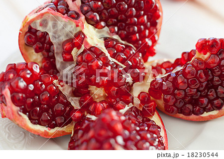 juicy lobules of garnet on plate  18230544