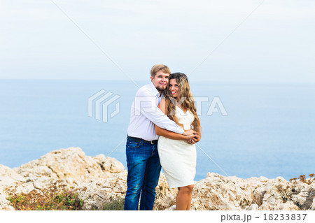 Romantic couple on the beach 18233837