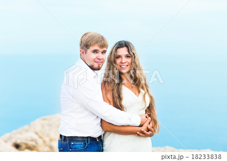 Romantic couple on the beach 18233838