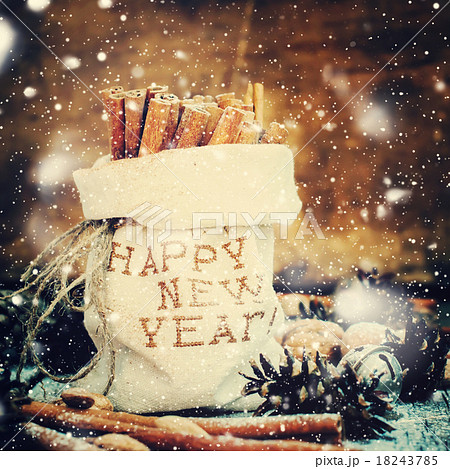 Sticks of Cinnamon in a Linen Bag. Drawn snow 18243785