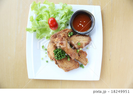 Fried chicken on wood background 18249951