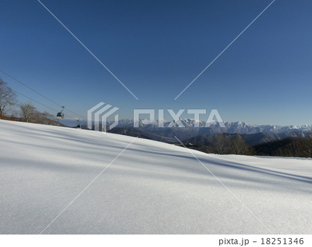 雪原と越後山脈の写真素材