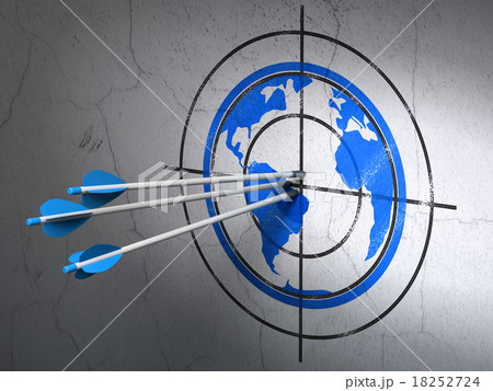 Studying concept: arrows in Globe target on wall 18252724