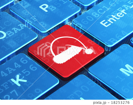 Holiday concept: Christmas Hat on computer Holiday concept: Christmas Hat on computer 18253276