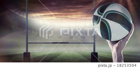 Composite image of close-up of of rugby player with arm raised Composite image of close-up of of rugby player with arm raised 18253504
