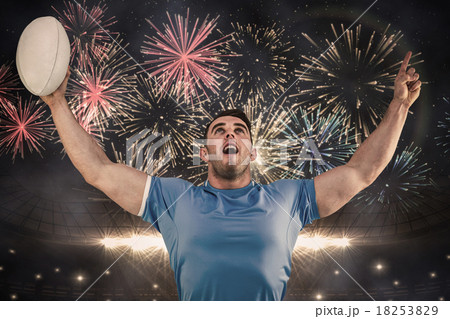 Composite image of rugby player cheering and pointing Composite image of rugby player cheering and pointing 18253829