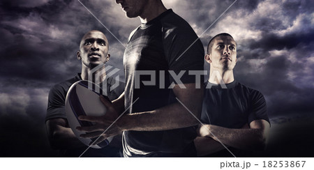 Composite image of calm rugby player thinking while holding ball 18253867