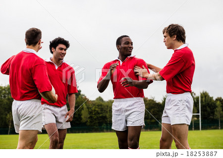 Rugby players celebrating a win Rugby players celebrating a win 18253887