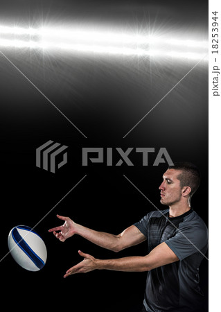 Composite image of rugby player catching ball Composite image of rugby player catching ball 18253944