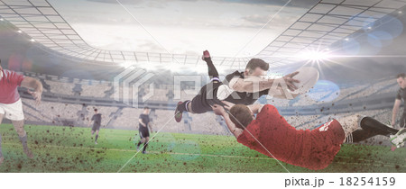Composite image of a rugby player scoring a try 18254159
