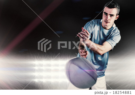 Composite image of rugby player throwing a rugby ball Composite image of rugby player throwing a rugby ball 18254881