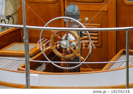 Steering wheel on the deck of a boat Steering wheel on the deck of a boat 18256238
