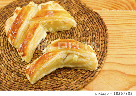 Sweet pie slices on a wooden table 18267302