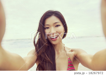 Asian Woman Girl at Beach Taking Selfie Photograph 18267972