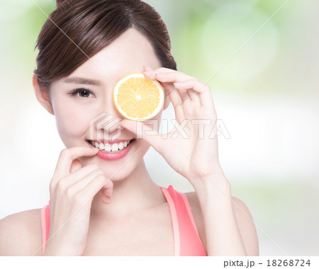 Woman show orange benefit health 18268724