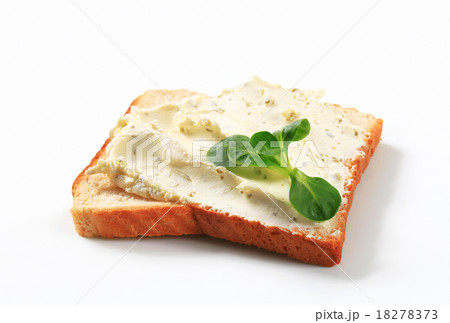 White bread with cheese spread 18278373
