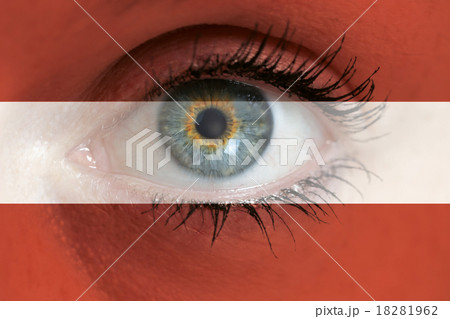 Eye looks through Austria flag background concept macro Eye looks through Austria flag background concept macro 18281962