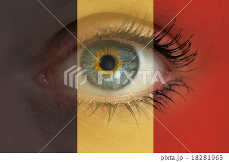 Eye looks through Belgium flag background concept macro 18281963