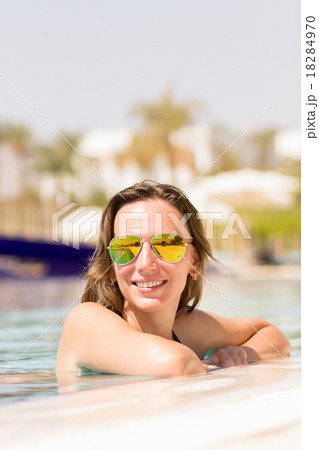 Gorgeous caucasian woman enjoying summer vacation Gorgeous caucasian woman enjoying summer vacation 18284970