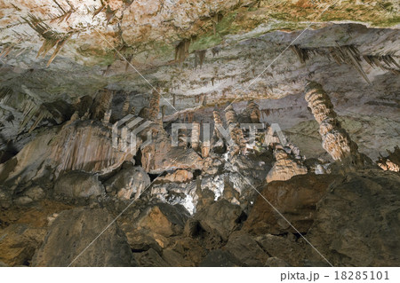 Cave inside with stalactites and stalagmites Cave inside with stalactites and stalagmites 18285101
