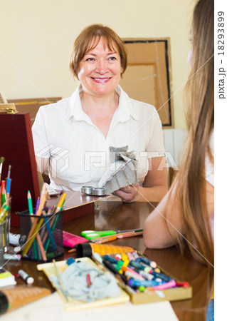 Senior artist painting a new picture 18293899