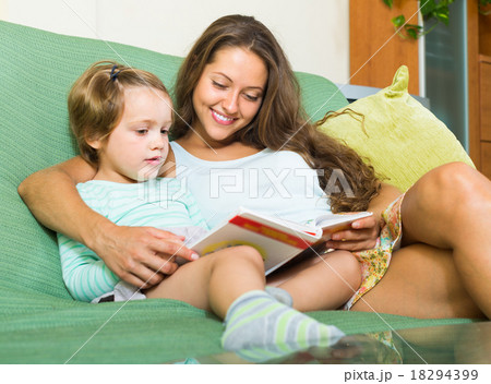Mother and daughter reading book Mother and daughter reading book 18294399