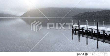 Tranquil peaceful lake with jetty New Zealand Concept Tranquil peaceful lake with jetty New Zealand Concept 18298832