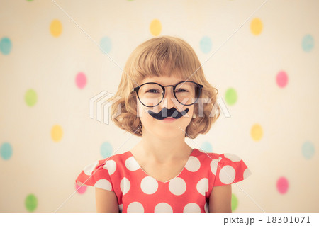 Funny kid with fake mustache 18301071