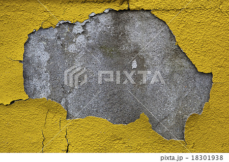 Old wall with dirty broken weathered yellow paint Old wall with dirty broken weathered yellow paint 18301938