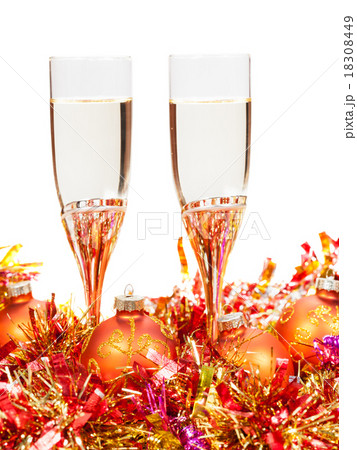 glasses of sparkling wine and orange Xmas balls glasses of sparkling wine and orange Xmas balls 18308449