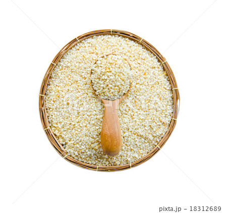 sesame seed in spoon wood and weave basket. 18312689
