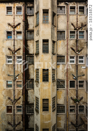 Facade of a rundown old building Facade of a rundown old building 18318872