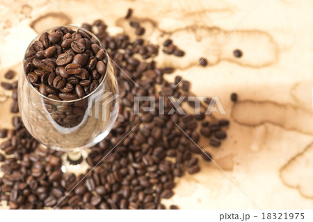 coffee bean in the glass on old paper coffee bean in the glass on old paper 18321975