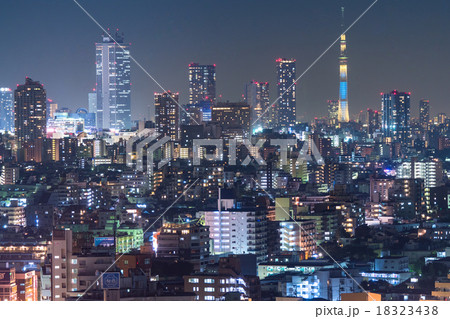 東京 スカイツリーと高層ビルと住宅街の夜景の写真素材