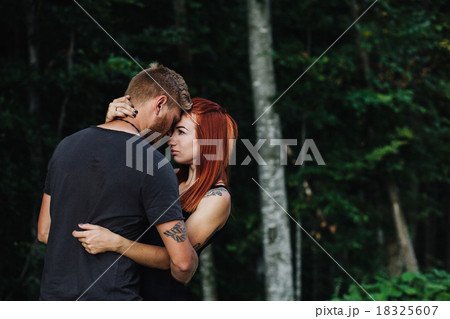 beautiful couple on the background of forest 18325607