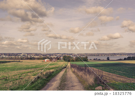 Long road in a countryside Long road in a countryside 18325776