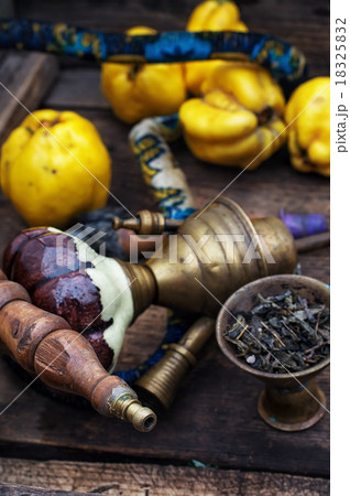 Still life with retro hookah and quince 18325832