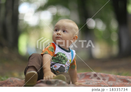little boy in summer park 18335734