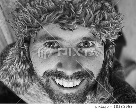 portrait of a smiling funny man with a beard 18335968